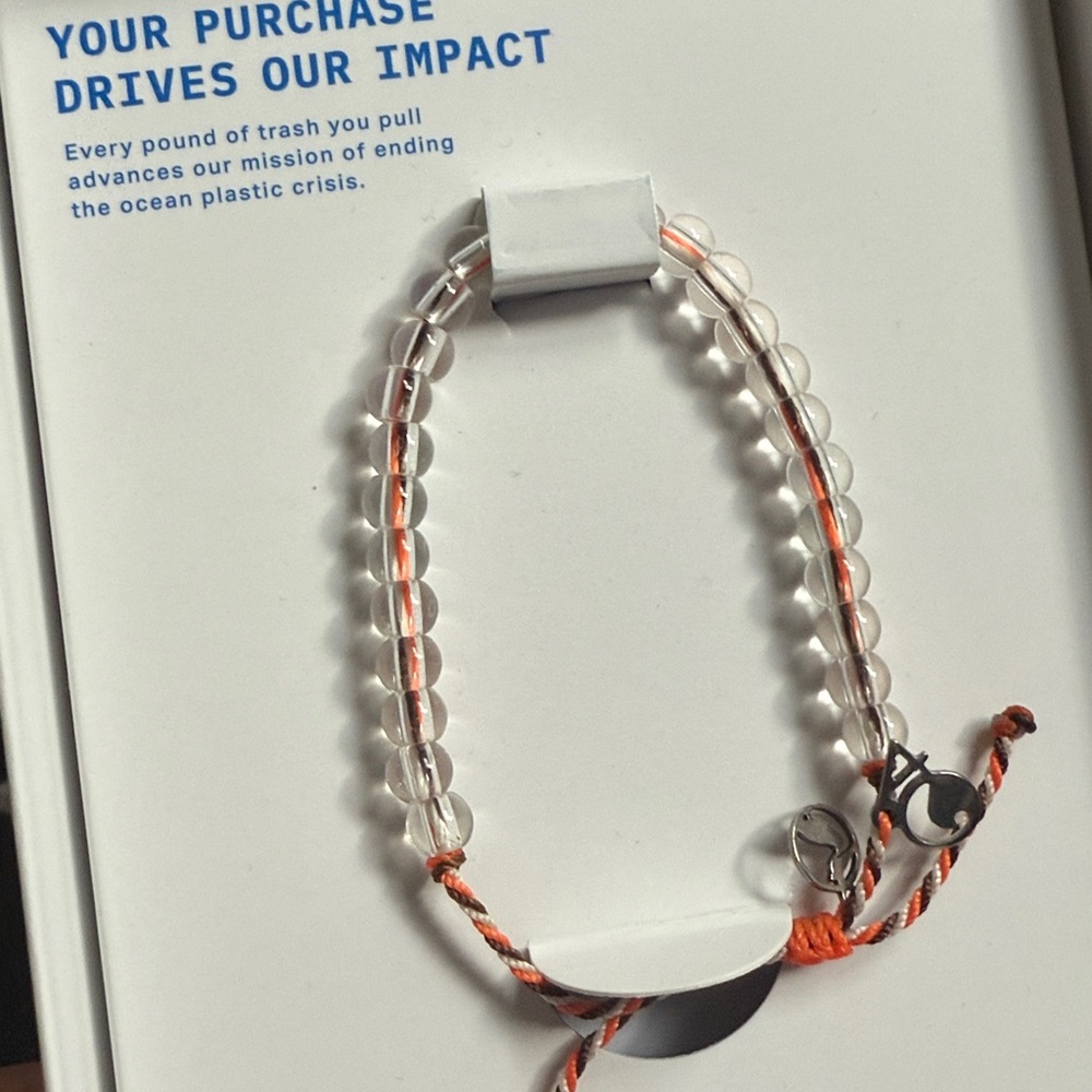4Ocean Limited Edition Pelican Bracelet Clear Beaded Bracelet with Orange Cord
